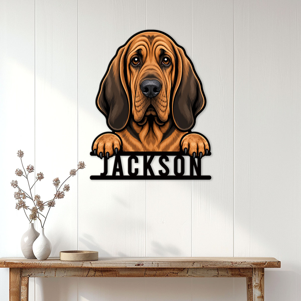 Bloodhound dog metal wall sign displayed above a console table in a bright entryway