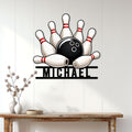 Bowling wall decor displayed above a console table, featuring a ball and pins in a bright home interior