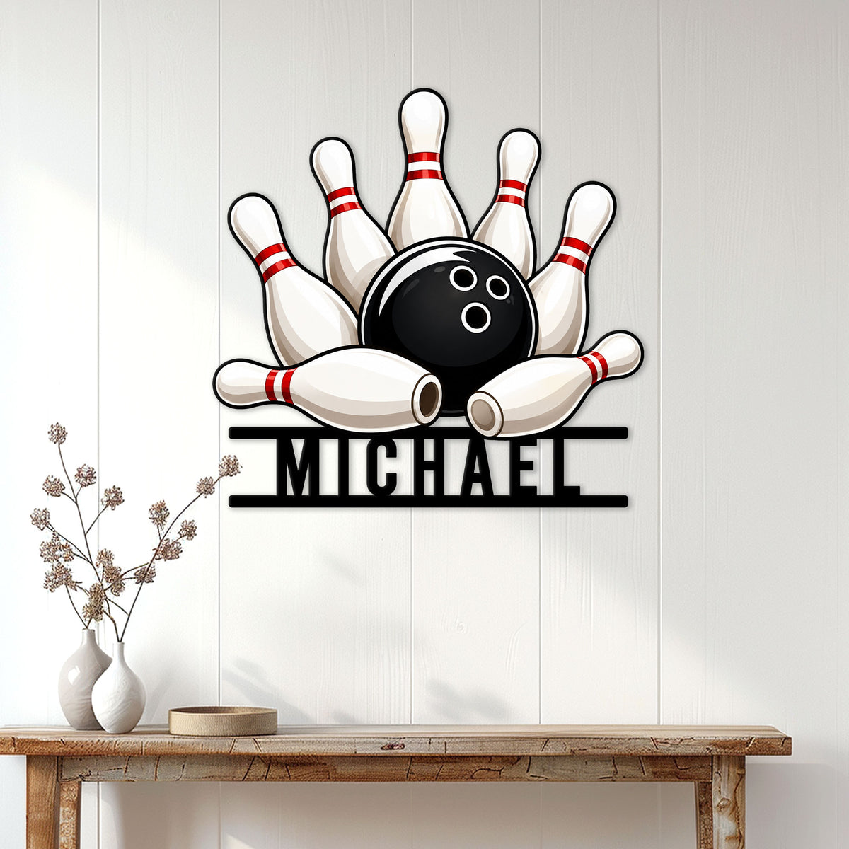 Bowling wall decor displayed above a console table, featuring a ball and pins in a bright home interior