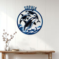 Orca wall decor displayed above a console table in a bright coastal-inspired room