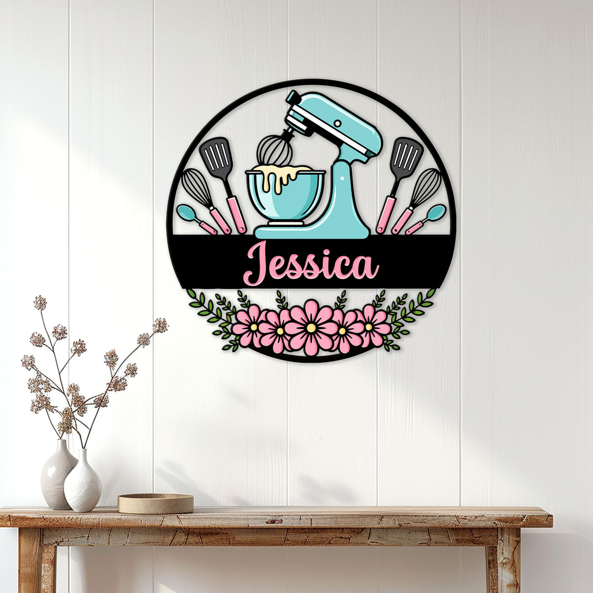 Floral baking wall sign displayed on a white paneled wall above a rustic console table