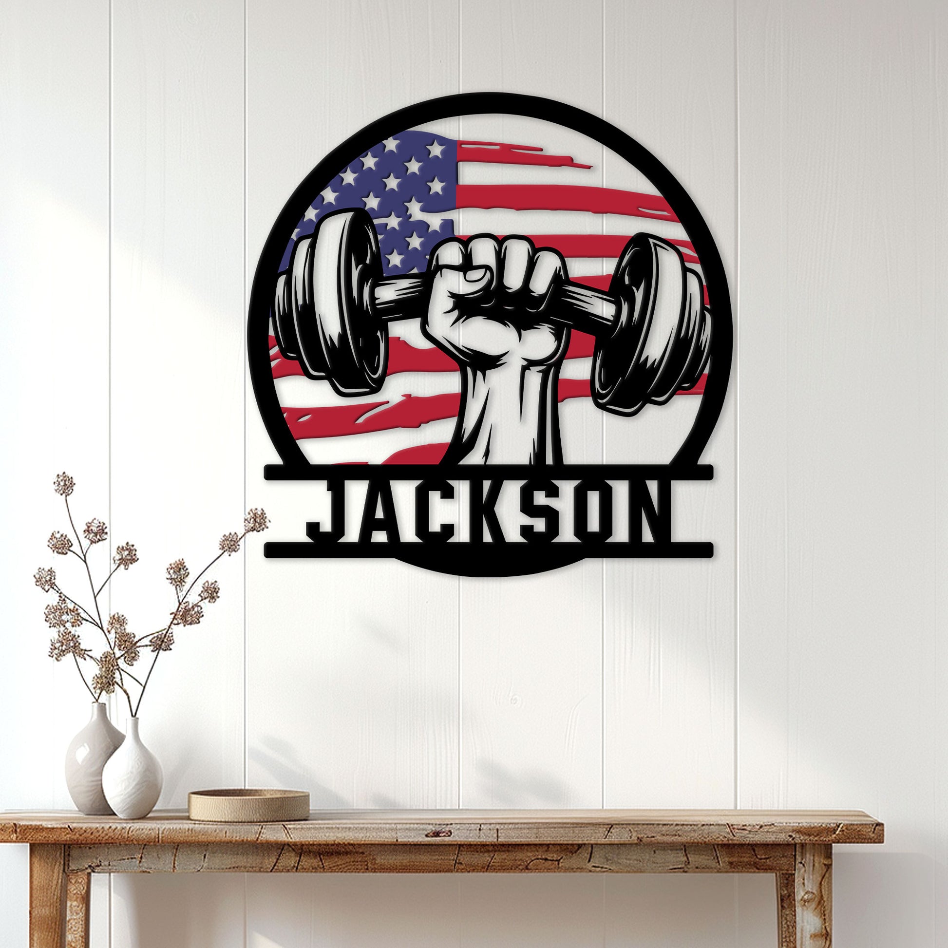 Patriotic dumbbell and raised fist metal sign displayed on a bright paneled wall