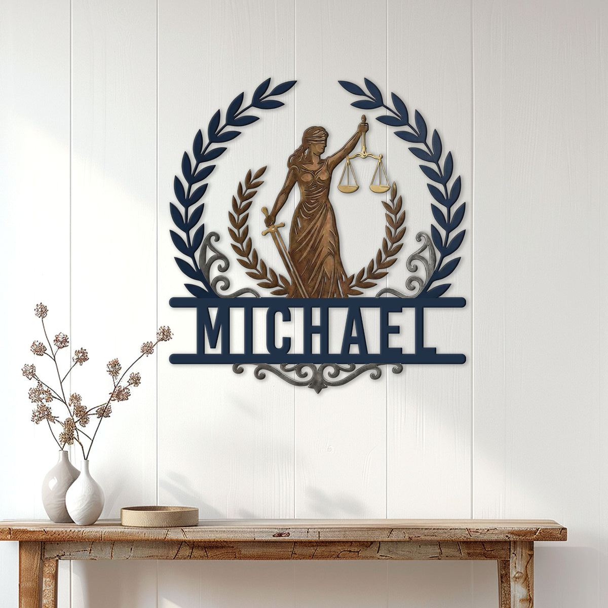 Lady Justice lawyer wall sign displayed above a console table in a bright office or home interior