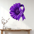 Fibromyalgia awareness metal sign with a purple ribbon and flower displayed on a bright wall