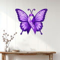 Purple Fibromyalgia awareness butterfly sign displayed on a light wood-paneled wall
