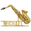 Golden saxophone metal sign with detailed keys and a bold cutout base