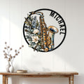 Floral saxophone wall sign displayed on a light wood-paneled wall above a console table