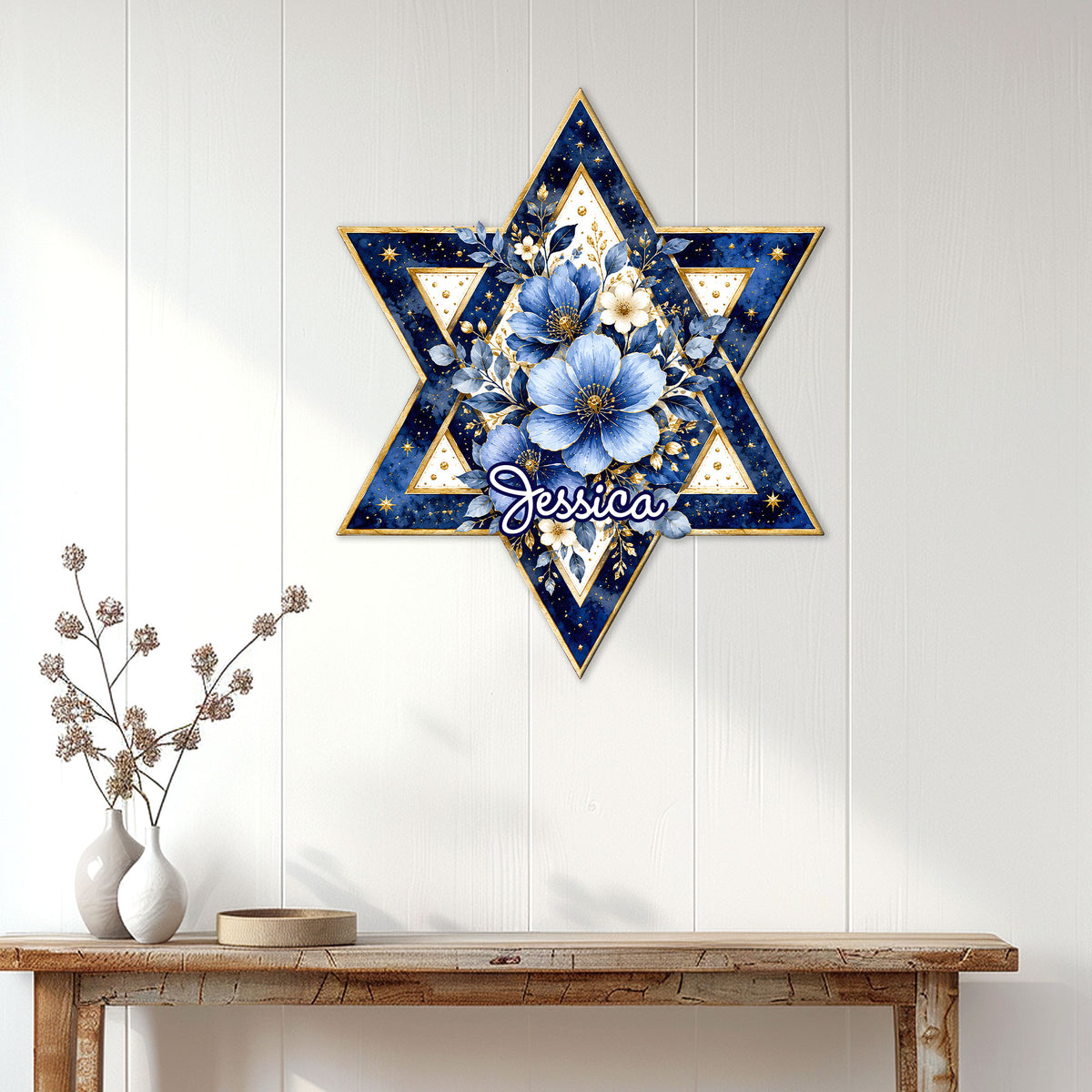 Hanukkah Star of David metal sign displayed on a light paneled wall above a console table