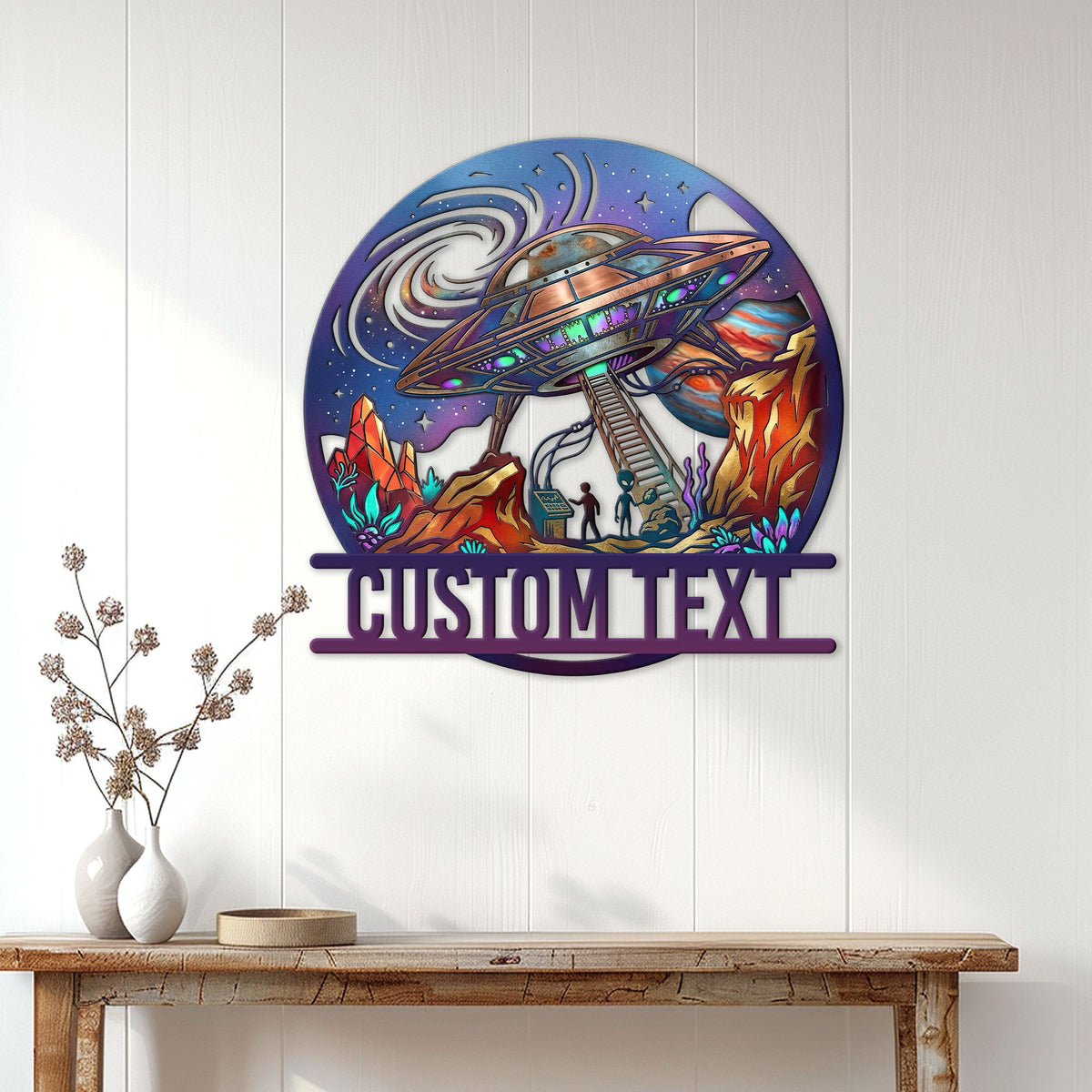 UFO wall sign displayed above a console table in a bright modern room with white paneling