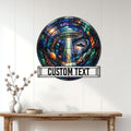 UFO wall sign displayed above a console table, featuring a glowing saucer beam and vibrant galaxy scene
