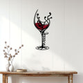 Ornate wine glass metal wall decor displayed on a bright paneled wall above a console table