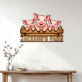Pig family metal sign displayed on a white paneled wall in a rustic farmhouse entryway