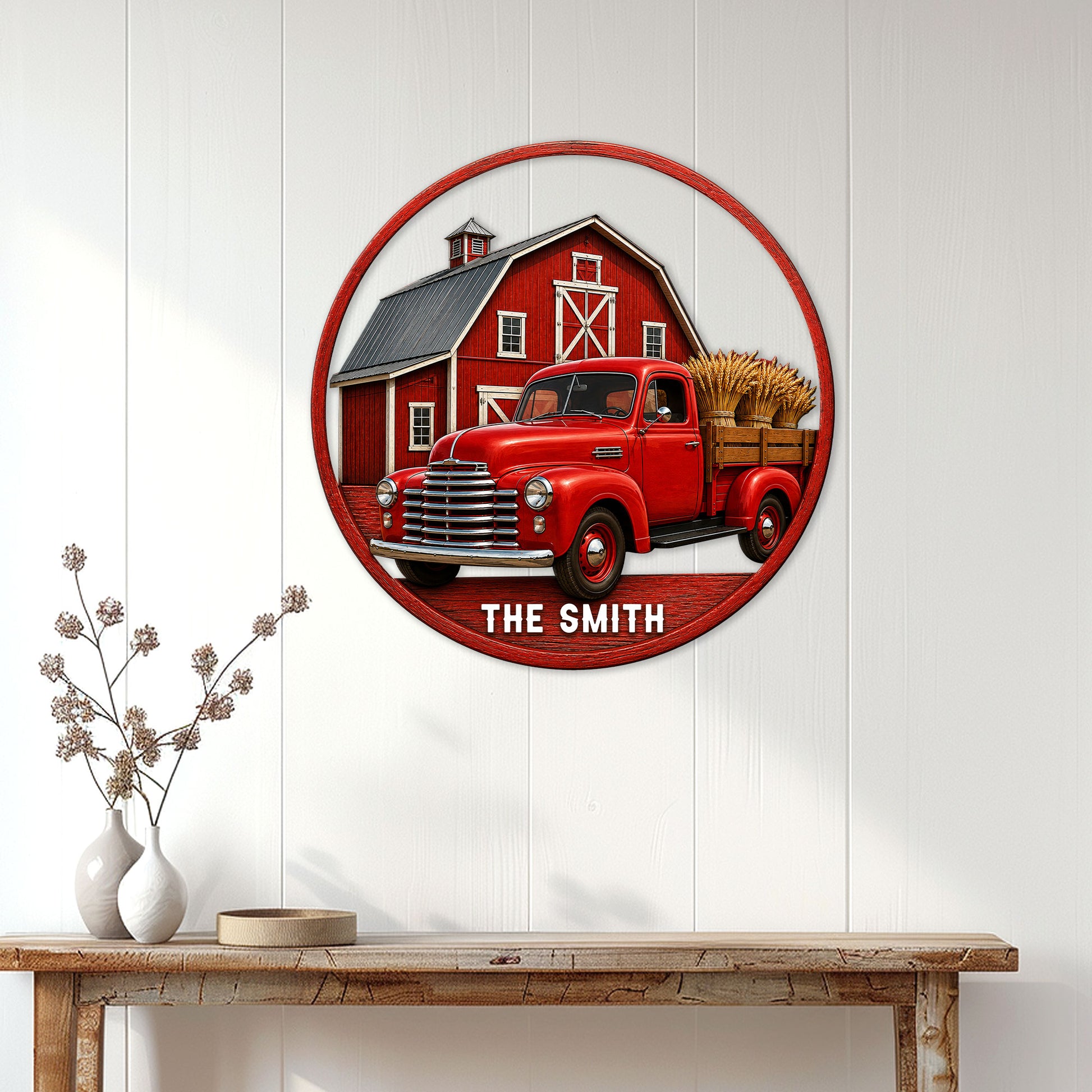 Farm truck metal sign displayed on a white paneled wall above a rustic console table in a farmhouse interior
