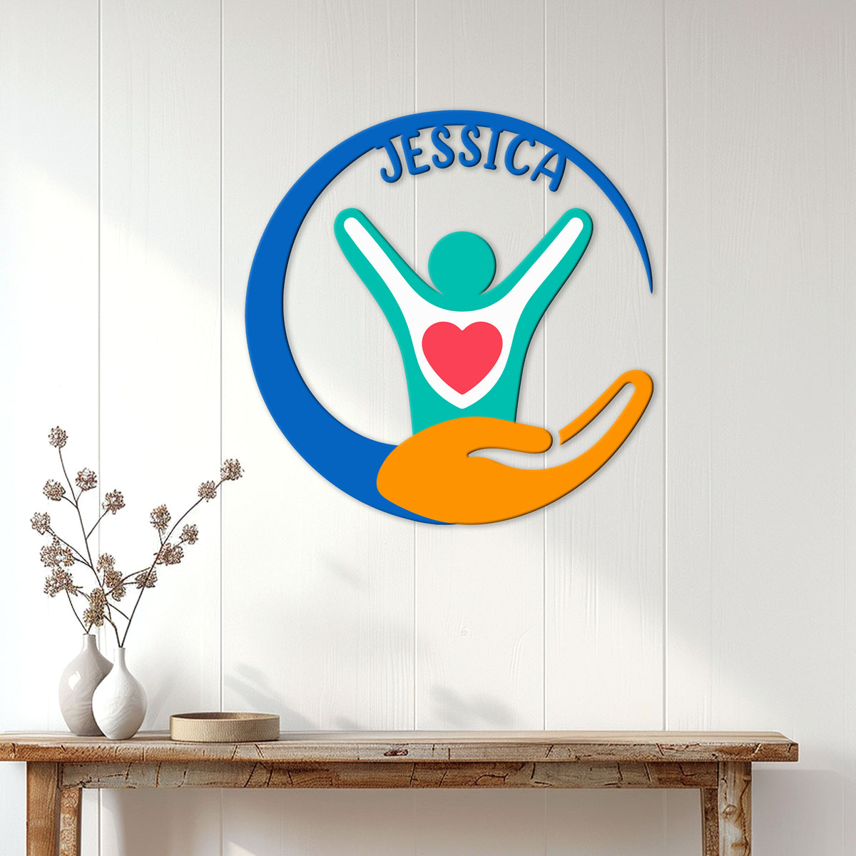 Caregiver wall sign displayed on a white paneled wall above a console table