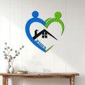 Caregiver metal wall sign displayed on a white paneled wall above a console table