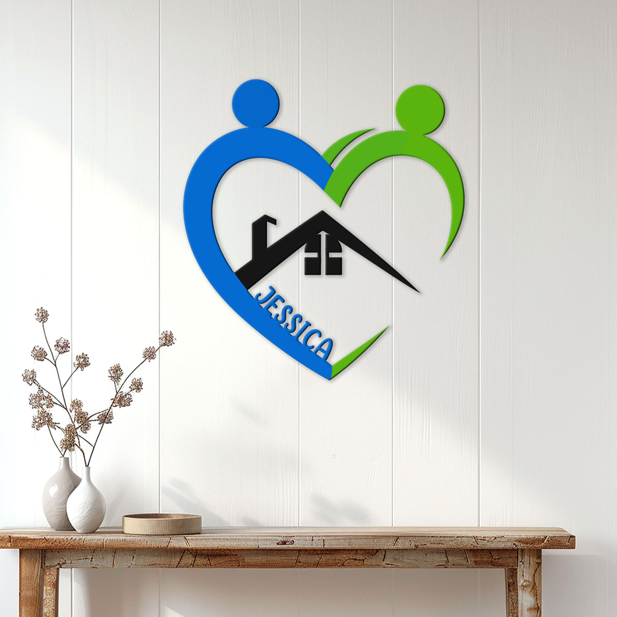 Caregiver metal wall sign displayed on a white paneled wall above a console table