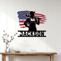 Patriotic plumber wall decor displayed on a white paneled wall above a rustic console table
