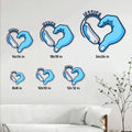 Sign language heart hands metal sign shown in multiple size options on a living room wall