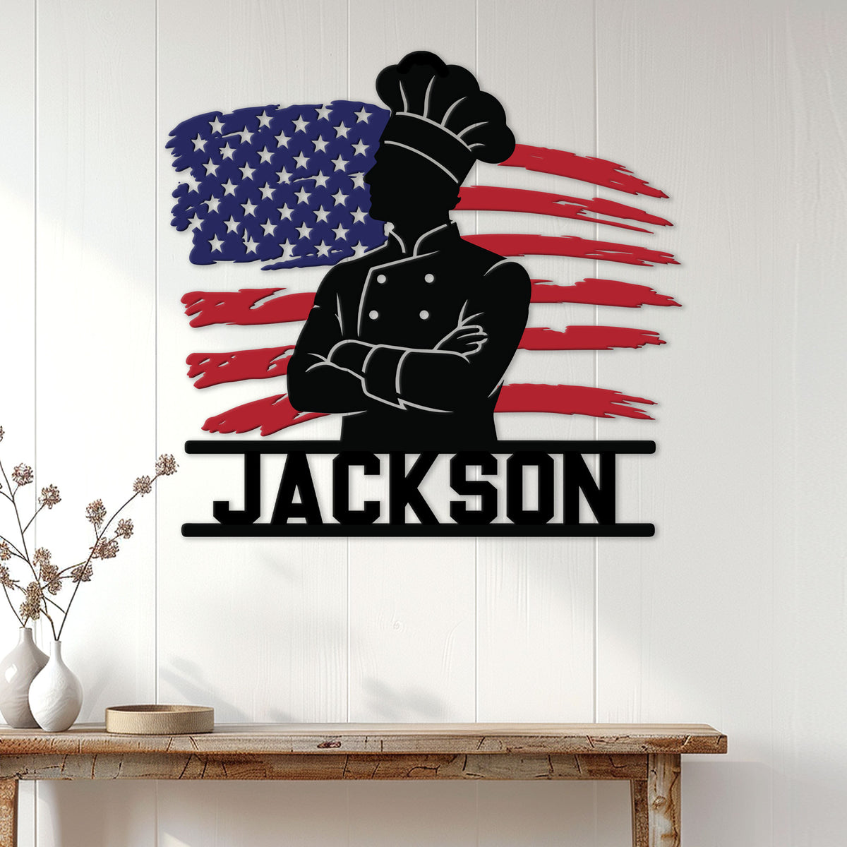 Patriotic chef metal sign displayed on a white paneled wall as kitchen and home decor