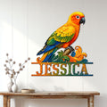 Colorful conure wall sign displayed above a console table in a bright home interior