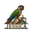 Colorful conure perched above ornate botanical scrollwork on a custom metal wall sign