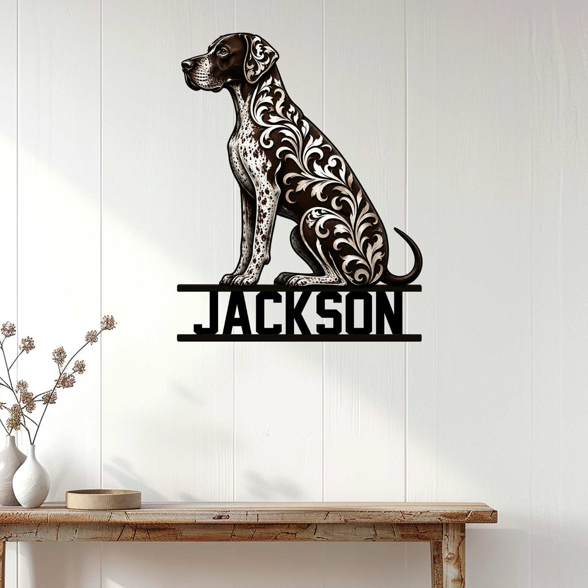 Decorative German Shorthaired Pointer metal wall sign displayed on a light wood-paneled home interior wall