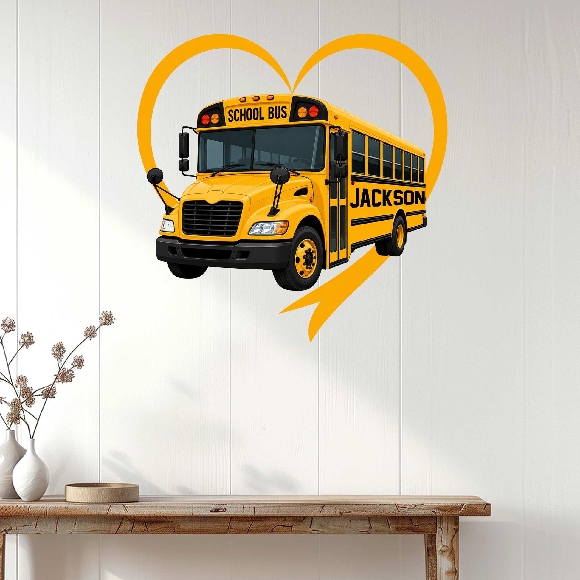 School bus wall sign displayed on a light wood-paneled wall in a welcoming home