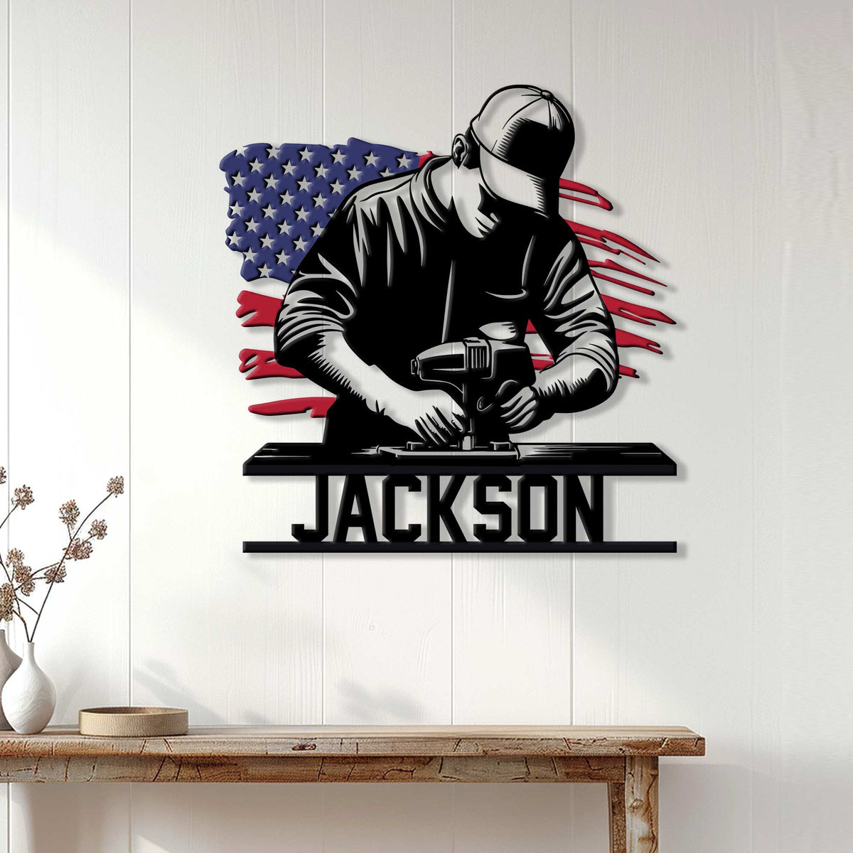 Patriotic carpenter metal sign displayed on a white paneled wall above a rustic wood console