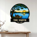 Lake house wall decor displayed on a white paneled wall, featuring a sunset lake and peaceful dock scene