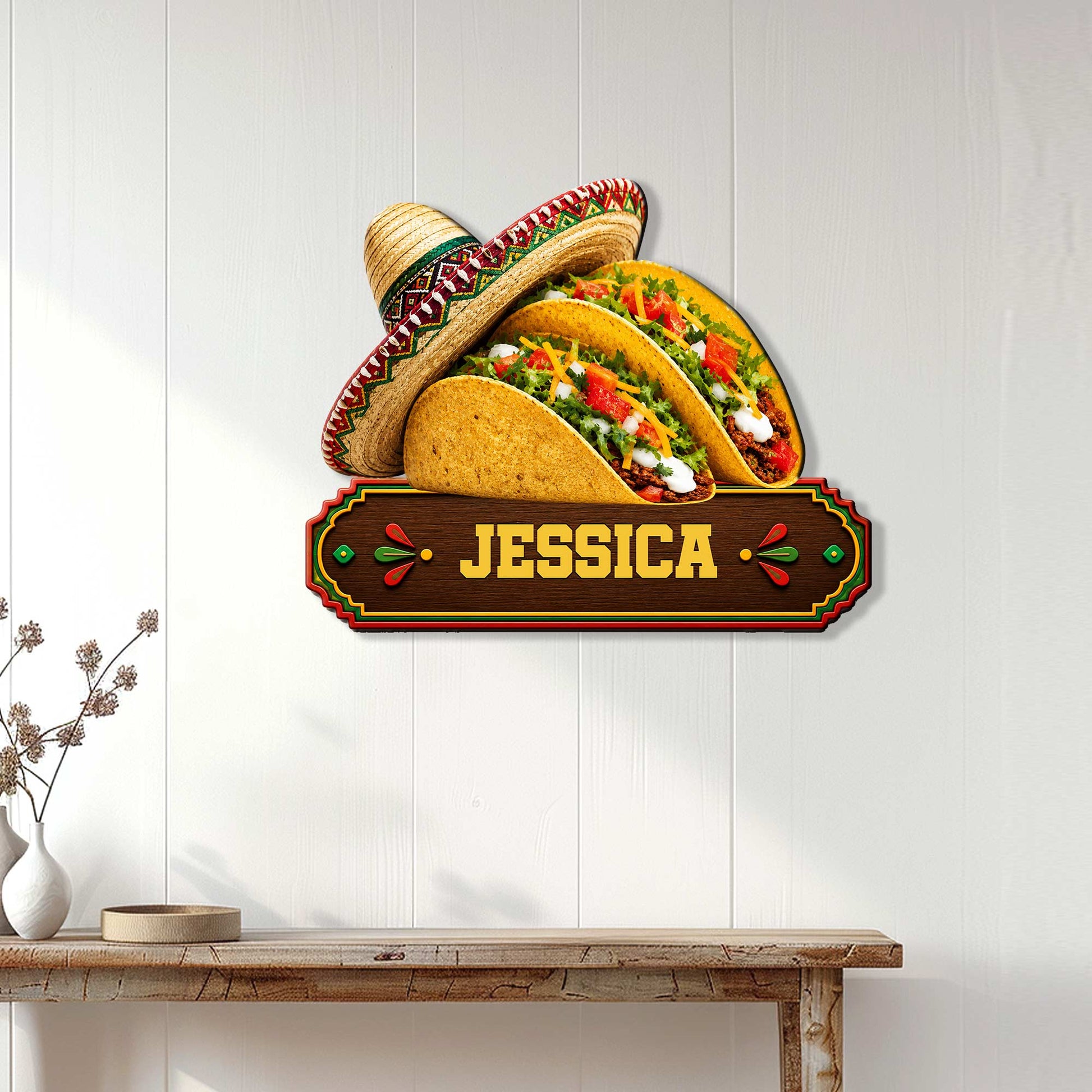 Taco wall sign displayed on a light wood wall above a console table in a casual home setting