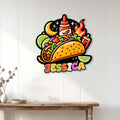 Colorful custom taco metal sign displayed as kitchen wall decor above a wooden console table