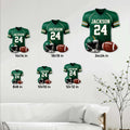 Football jersey metal sign displayed in multiple size options on a light wall above a sofa