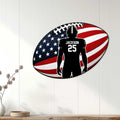 American football wall sign displayed on a light wood-paneled wall in a home interior