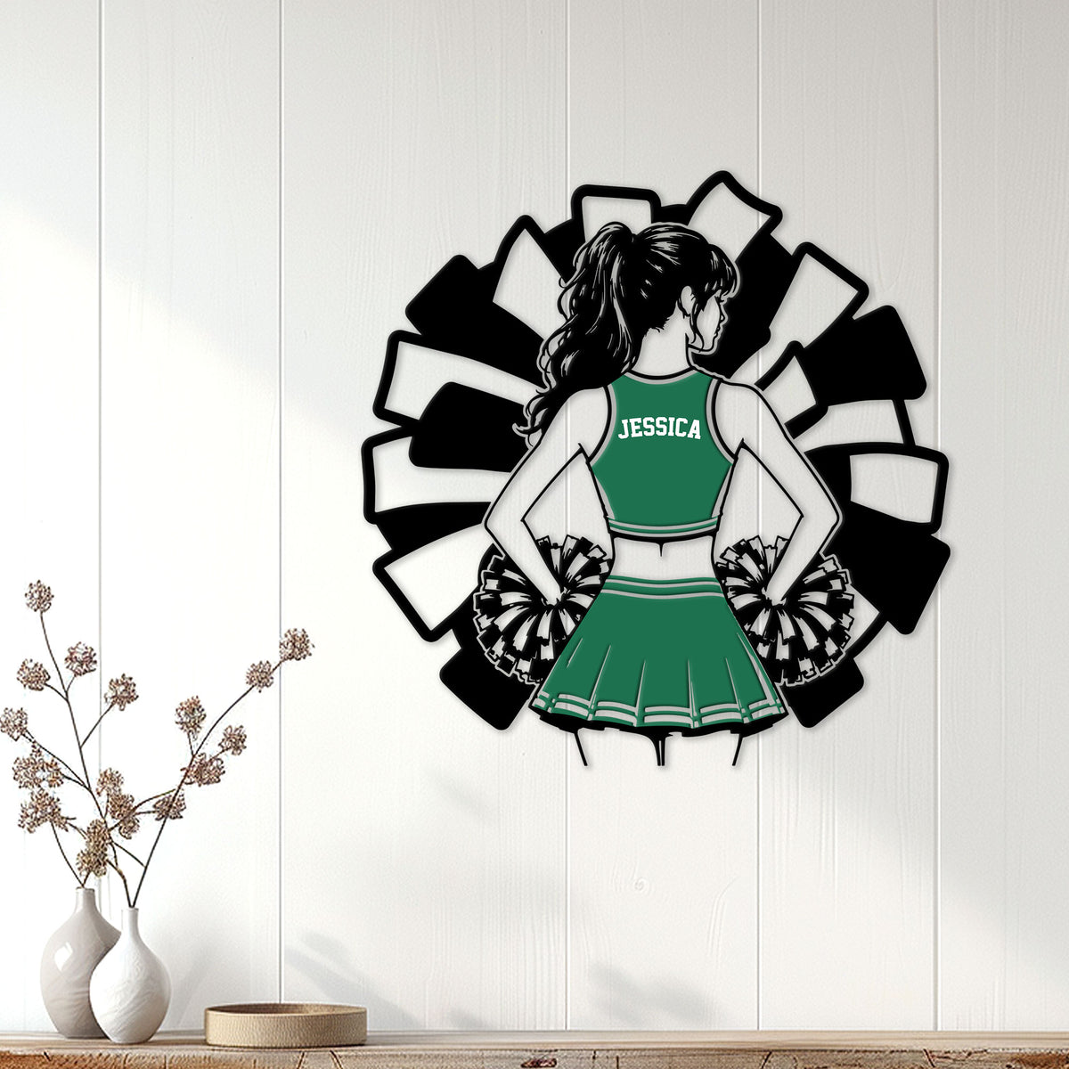 Green cheerleader metal sign styled as wall decor above a console with decorative vases