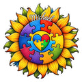 Custom autism metal sign with colorful puzzle pieces, a heart center, and bright sunflower petals