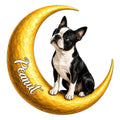 Boston Terrier metal sign featuring a black and white dog seated on a golden crescent moon
