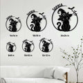 Black cat Halloween metal sign shown in multiple size options above a living room sofa