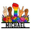 Custom Pride metal sign featuring diverse raised hands, a rainbow fist, and a colorful floral border