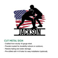 Wrestling wall sign shown with cut metal construction details and a bold grappler silhouette design