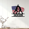Wrestling metal sign displayed on a bright paneled wall with two grapplers and a patriotic flag backdrop