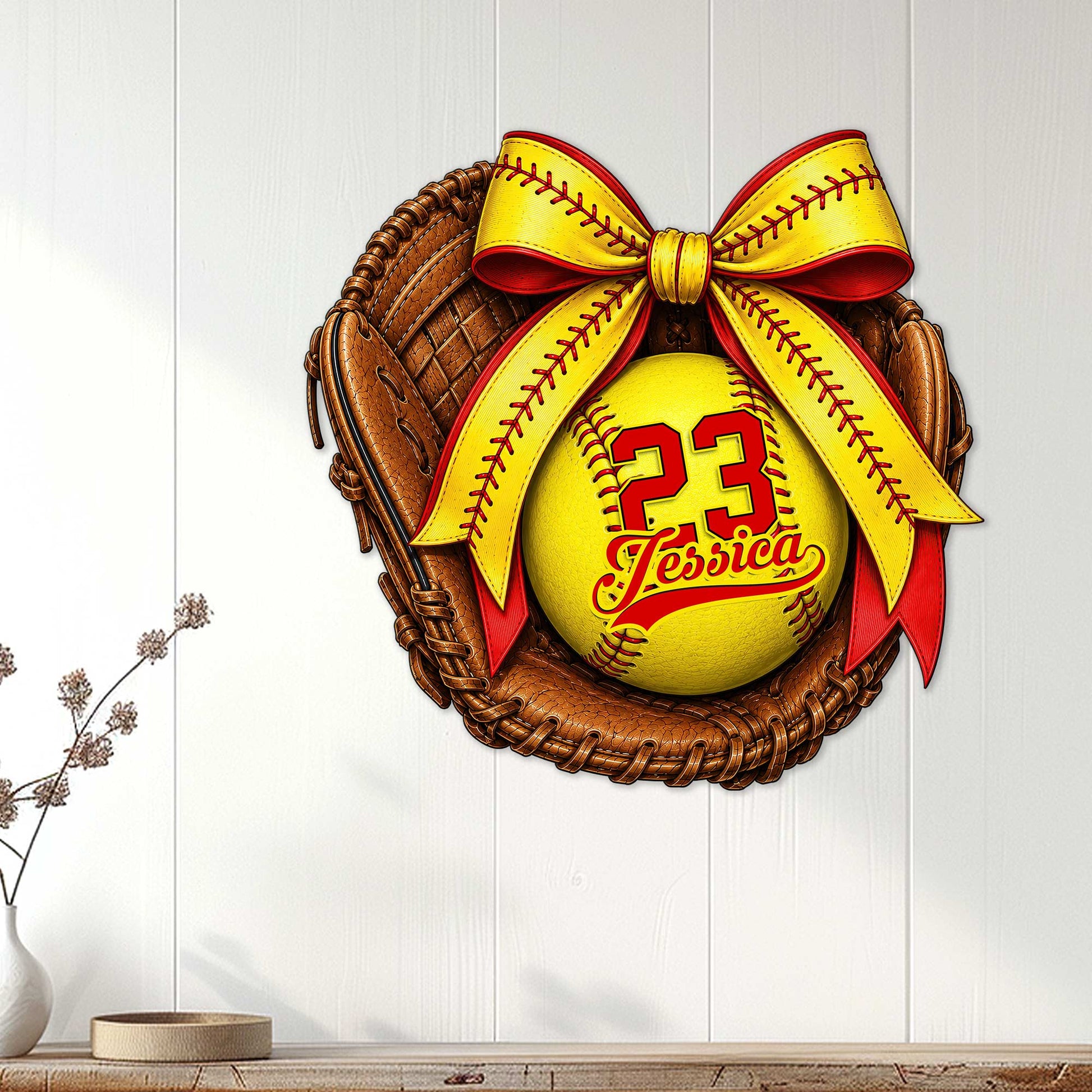 Softball metal wall sign displayed on a white paneled wall above a console table