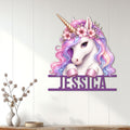 Floral unicorn metal wall sign displayed on a white paneled wall in a bright home interior