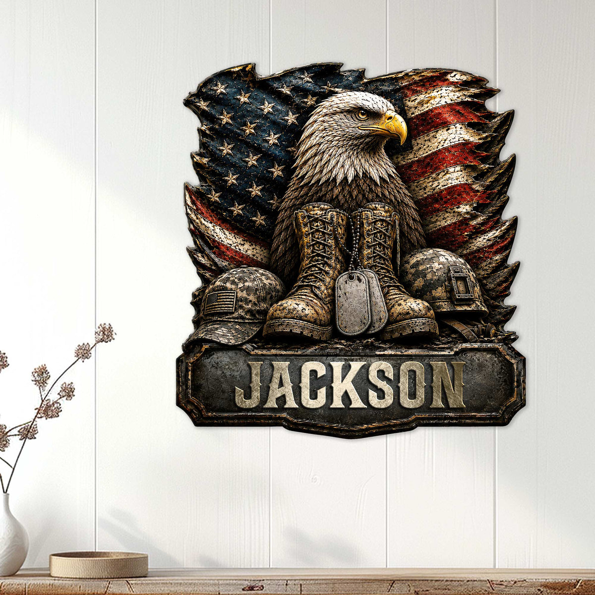 Veteran metal sign displayed on a light paneled wall with an eagle, American flag, boots, and military gear