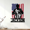 Lineman wall sign displayed on white paneling, featuring a utility worker silhouette and American flag