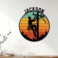 Lineman wall sign displayed on white paneling, showing a lineworker repairing power lines at sunset