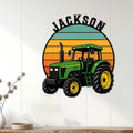 Green farm tractor metal sign displayed on a white paneled wall in a bright home setting