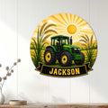 Farm tractor wall sign displayed on white paneling with wheat fields and a bright sunrise design