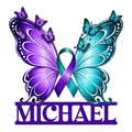 Suicide prevention metal sign with purple and teal butterflies surrounding an awareness ribbon