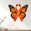 Orange MS awareness butterfly sign displayed as wall decor on a white paneled wall