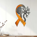 Multiple Sclerosis awareness ribbon sign displayed on a white paneled wall as supportive home decor
